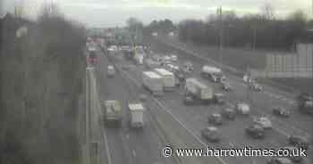 LIVE updates on rush hour travel after 'overturned car' blocks M25