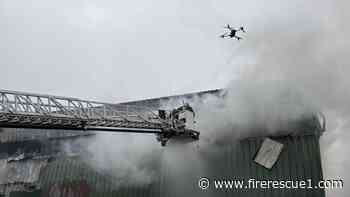 Boston FFs battle 8-alarm blaze in a construction waste recycling center