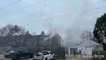 1 person dead after early-morning fire at townhouse complex on Main Street West