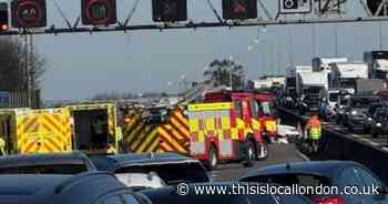 Three people injured with one trapped in vehicle after crash on M25