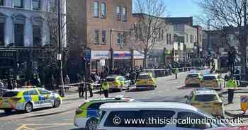 Woman, 27, taken to hospital after being hit by police car in Camberwell