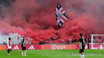 Ajax-supporters vieren feest en steken vuurwerk af bij Feyenoord en PSV