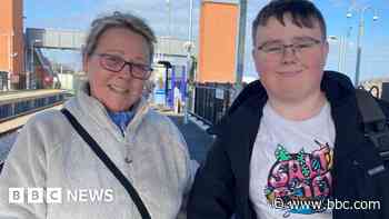 First rail passengers travel from delayed station