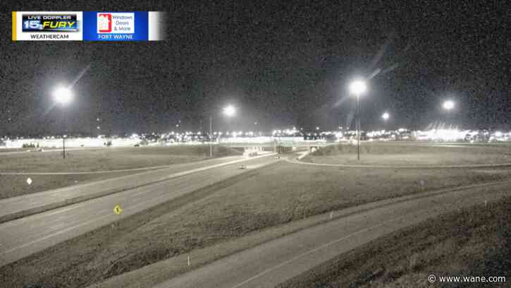 Another warm day with showers/storms & light snow coming