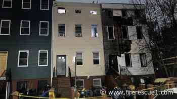 FDNY FF remains critical after collapsing on roof during 2-alarm fire