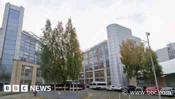 College evacuated and four held after fight