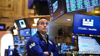 Wall Street slips and heads for a fifth straight weekly loss