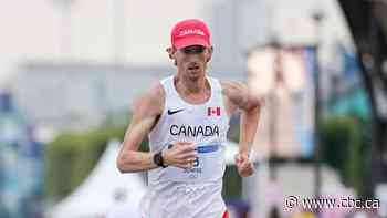 Canada's Evan Dunfee sets world record in 35km race walk, laps entire field