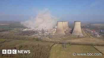 Moment chimney is demolished at  power station