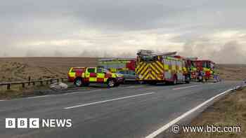 Fire crews check for hotspots after moor blaze