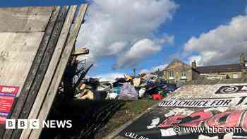 Fly-tipping cost could be shown on signs - council
