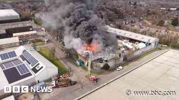 Fire crews tackle scrapyard blaze near retail park
