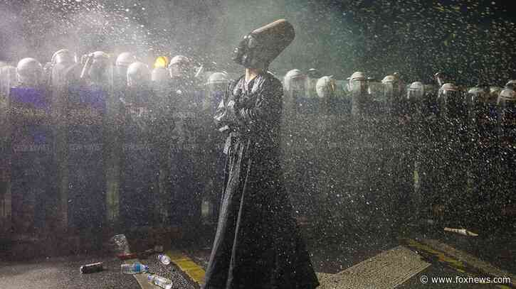 Turkey jails Istanbul mayor before trial, protests rage throughout city