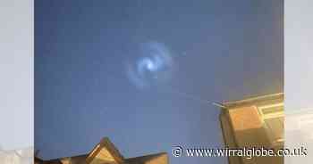 Mystery of 'large glowing spiral' in sky over Wirral solved