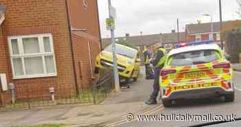 Woman injured after car becomes lodged on fence in east Hull