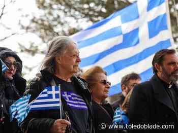 Photo Gallery: Greek flag raised at the One Government Center