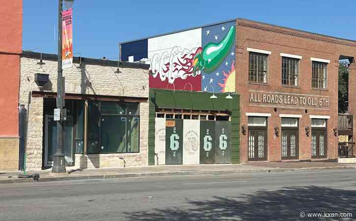 When will new businesses fill vacant buildings on Sixth Street?