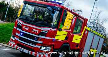 Firefighters rush to canal embankment blaze started by sun shining on bottles