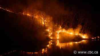 South Korea's worst-ever wildfires double in size, killing dozens of people and incinerating temples