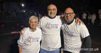 Intrepid supporters of Mount Vernon tackle hot coals fire walk