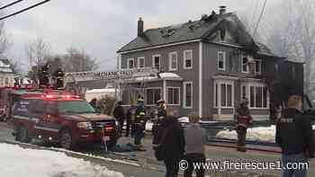 Firefighters from 11 Maine fire departments battle house fire