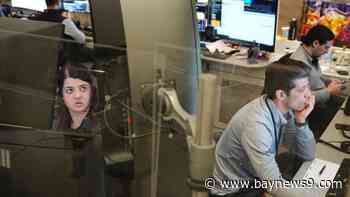 Wall Street tumbles, and S&P 500 drops 2% on worries about slower economy, higher inflation