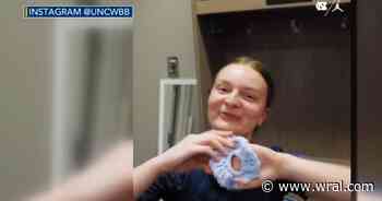Young Tar Heels fan delights UNC women with hand-made scrunchies worn during Sweet Sixteen game