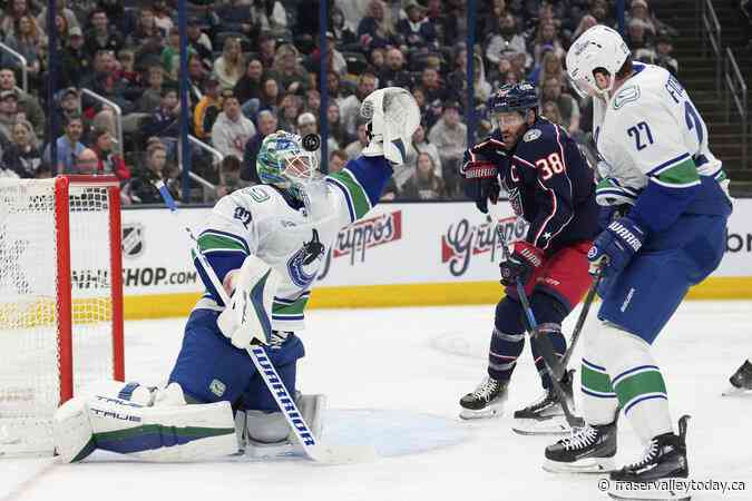 Jenner scores twice, Blue Jackets rally for 7-6 victory over Canucks in shootout