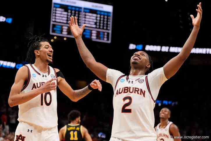 NCAA Tournament: Auburn rallies past Michigan in 2nd half