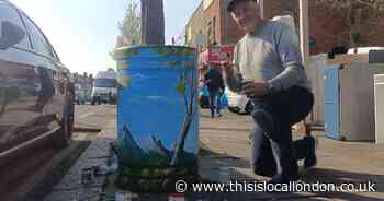 An artist transformed a bin with a beachside scene and captivated passers by
