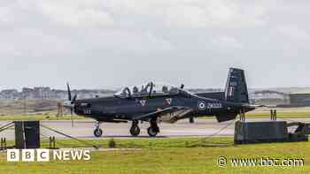 Man charged after wielding axe outside RAF base