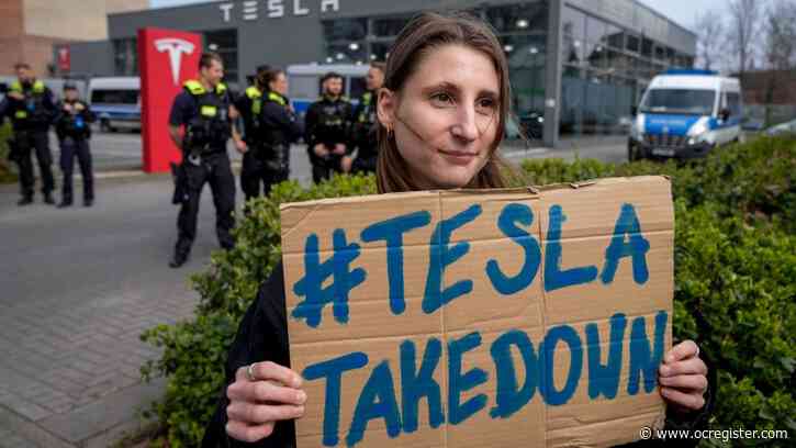 Protesters rebelling against Elon Musk’s purge of US government swarm Tesla showrooms