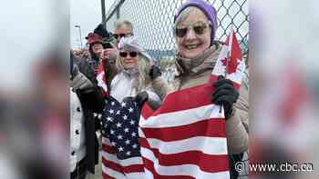 Fort Frances, Ont., and International Falls, Minn., residents link at border crossing in show of unity