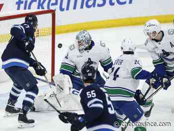 Jets 3, Canucks 1: Connor Hellebuyck rebounds to outduel Thatcher Demko in pivotal tilt