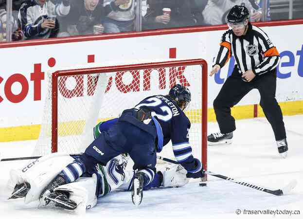 NHL roundup: Jets beat Canucks 3-1 for third straight win