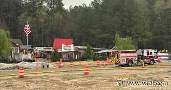 Crews battle fire at shopping village in north Raleigh