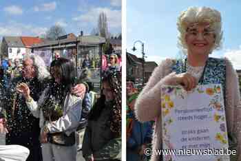 Wuitenskinderen serveren kleurrijke carnavalspakjes en massa confetti
