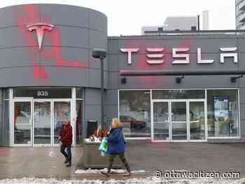One arrested for spray-painting Ottawa Tesla dealership