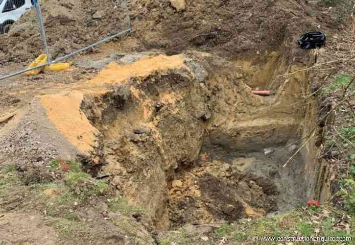 Worker trapped in collapsed septic tank pit