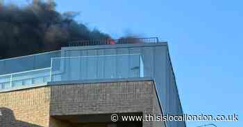 LIVE as flat fire burns near Dalston station with A10 closed and heavy traffic