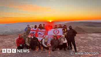Friends climb peak in memory of man killed in Gaza