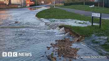 Burst water main closes busy road