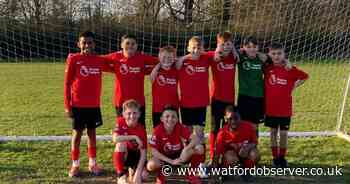 Unbeaten school football team reaches two cup finals