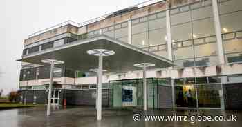 Wirral woman 'stormed' up to victim's home in dressing gown with hammer, court told