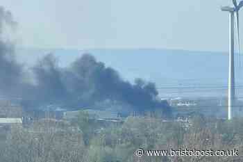 Live: Fire crews rush to huge blaze at waste depot