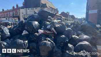 'Bin strike has left us with a 7ft dumping ground'