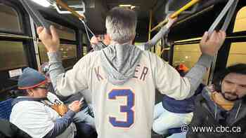 U.S. and Canadian fans put trade war aside for Detroit Tigers home opener