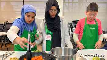 As these kids get hands-on with food, they're also learning about climate change