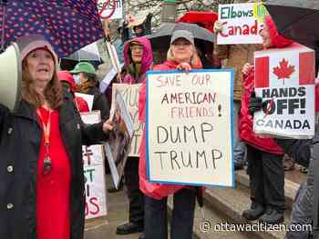 Hundreds march around U.S. Embassy in Ottawa to protest tariffs, Trump