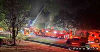 Firefighters battle Cary house fire